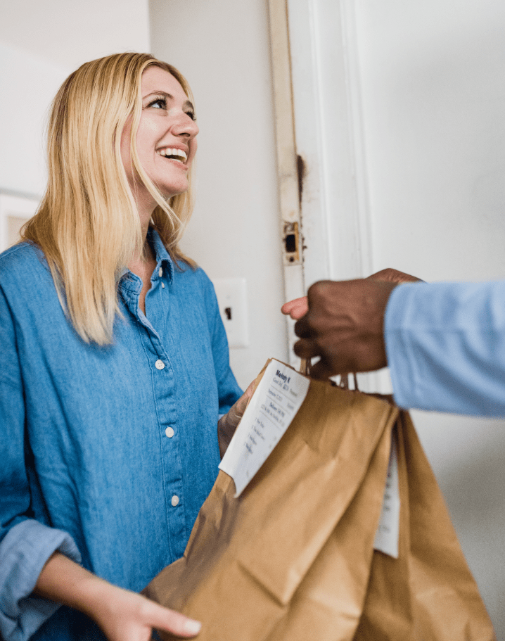 Girl receiving her food prep order