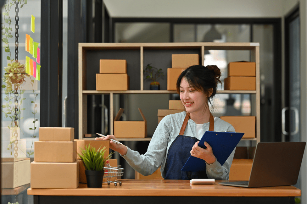 Woman keeping a track of all the boxes